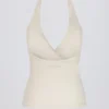 Camiseta sin mangas con cuello halter y espalda abierta en marfil jaspeado