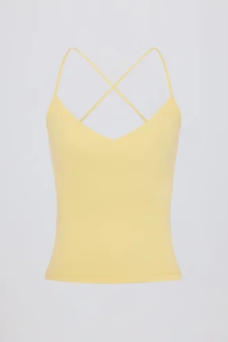 Camiseta sin mangas con espalda cruzada en color limón