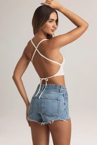 Camiseta sin mangas con espalda cruzada Zia en blanco