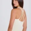Camiseta sin mangas larga con espalda cruzada en color crema