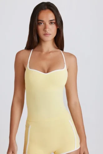 Camiseta sin mangas Soft Active con espalda cruzada en color limón