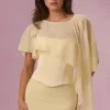 Capa de gasa Velina en amarillo mantequilla