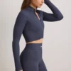 Chaqueta corta con cremallera FlexiRib en color Indigo Slate