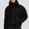 Chaqueta de esquí oversize corta e impermeable en leopardo negro
