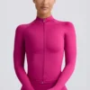 Chaqueta Define Luxe con cremallera en color baya