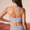 Corsé con cuello vuelto y adornos Selena en azul