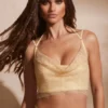 Corsé con cuello vuelto y adornos Selena en dorado