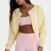 Cárdigan corto abotonado de jersey cepillado en amarillo suave