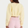 Cárdigan corto abotonado de jersey cepillado en amarillo suave