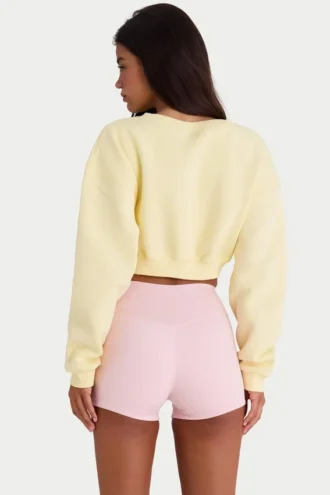 Cárdigan corto abotonado de jersey cepillado en amarillo suave