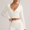 Cárdigan corto de punto elástico de modal Kiva en blanco
