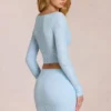 Cárdigan escotado de encaje Odelia en azul polvo
