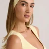 Diadema acanalada Candy Modal en amarillo crema