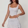 Falda A-line de talle medio con adornos Lorelei en blanco