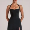 Falda ajustada de talle medio con abertura Tula en negro