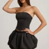 Falda Clemmy de talle medio con bajo abullonado en negro