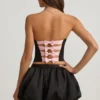 Falda Clemmy de talle medio con bajo abullonado en negro