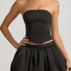 Falda Clemmy de talle medio con bajo abullonado en negro