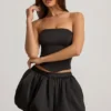 Falda Clemmy de talle medio con bajo abullonado en negro