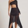Falda con bajo en forma de pañuelo y adornos Soustans en negro