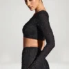 Falda con bajo en forma de pañuelo y adornos Soustans en negro