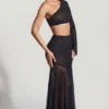 Falda con bajo en forma de pañuelo y adornos Soustans en negro