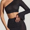 Falda con bajo en forma de pañuelo y adornos Soustans en negro