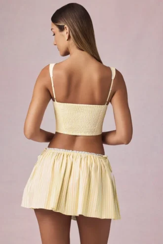 Falda con cordón y fruncidos Maira en rayas amarillo limón