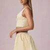 Falda con cordón y fruncidos Maira en rayas amarillo limón