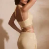 Falda con tirantes decorados Roux en dorado