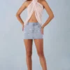 Falda de denim de talle medio Levara en denim claro