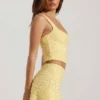 Falda de talle bajo con adornos Jianna en amarillo