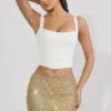 Falda de talle bajo con adornos Jianna en dorado