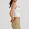 Falda de talle bajo con adornos Jianna en dorado