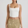 Falda de talle bajo con adornos Jianna en dorado