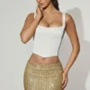 Falda de talle bajo con adornos Jianna en dorado
