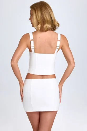 Falda de talle bajo con corte curvo de Issa en blanco