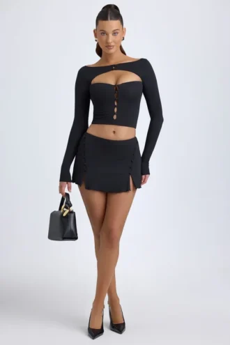 Falda de talle bajo con detalle de botones en modal «Dalla» en negro