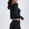 Falda de talle bajo con detalle de botones en modal «Dalla» en negro