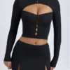 Falda de talle bajo con detalle de botones en modal «Dalla» en negro