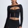 Falda de talle bajo con detalle de botones en modal «Dalla» en negro
