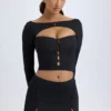 Falda de talle bajo con detalle de botones en modal «Dalla» en negro