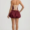 Falda de talle medio con bajo abullonado Clemmy en rojo vino
