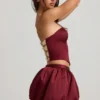 Falda de talle medio con bajo abullonado Clemmy en rojo vino