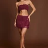 Falda de talle medio con flecos Maristella en rojo vino