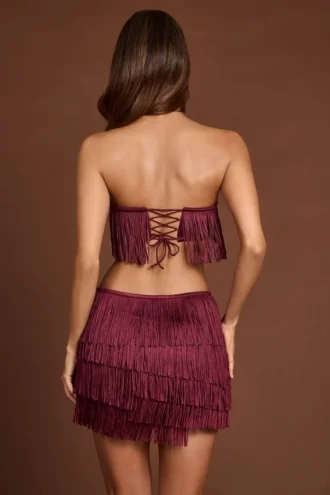 Falda de talle medio con flecos Maristella en rojo vino
