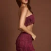 Falda de talle medio con flecos Maristella en rojo vino