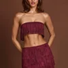 Falda de talle medio con flecos Maristella en rojo vino