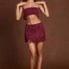 Falda de talle medio con flecos Maristella en rojo vino