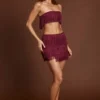 Falda de talle medio con flecos Maristella en rojo vino